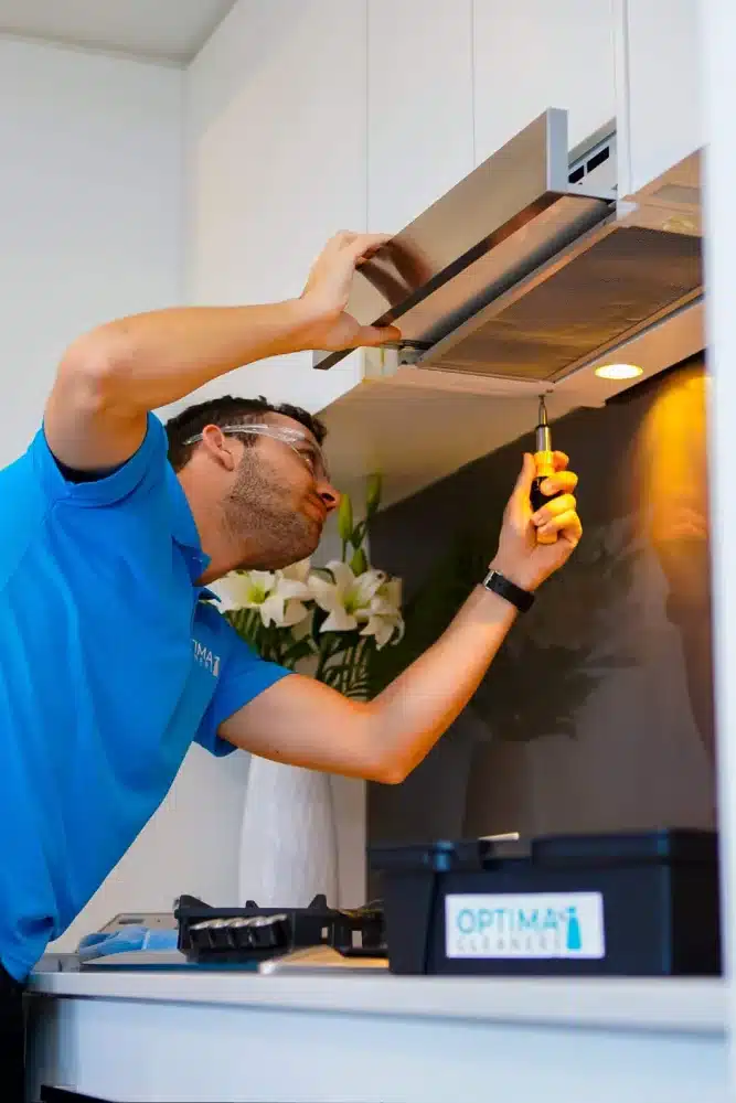 Rangehood cleaning by an Optima Cleaners technician in Brisbane