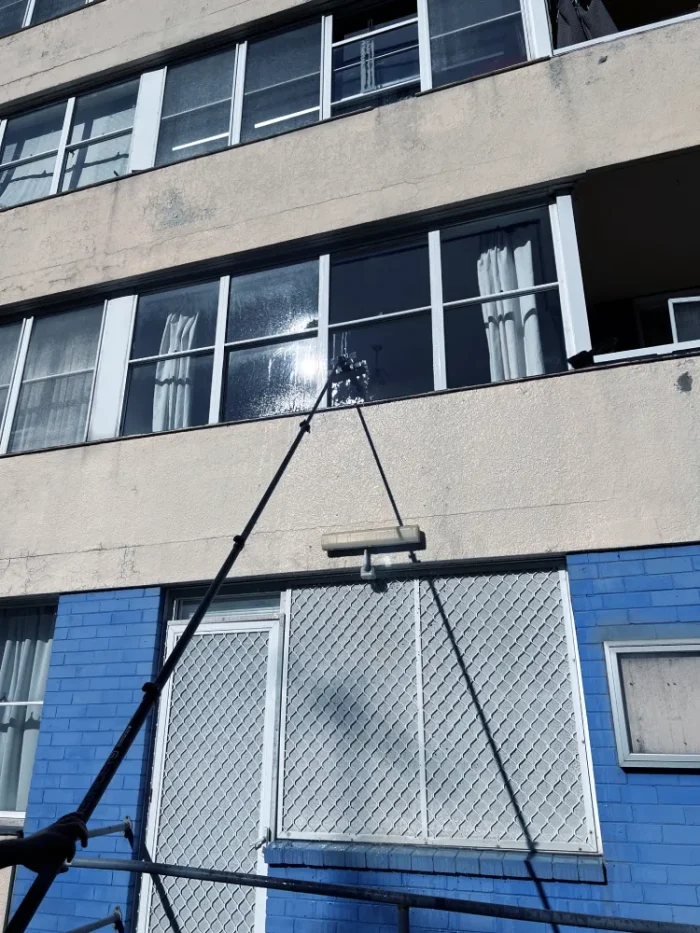 Window cleaning - telescoping window cleaner - 2nd floor