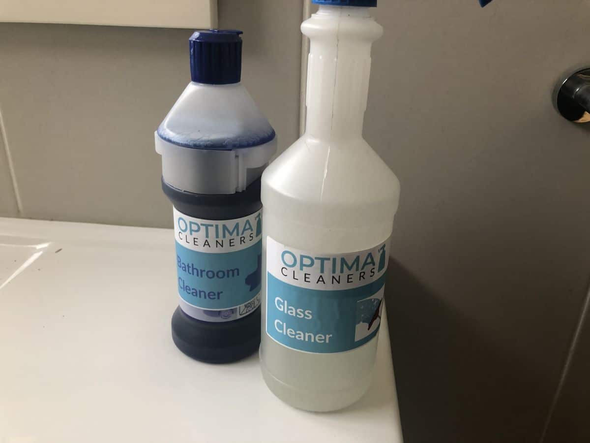 Optima Cleaners bathroom cleaner and glass cleaner bottles
