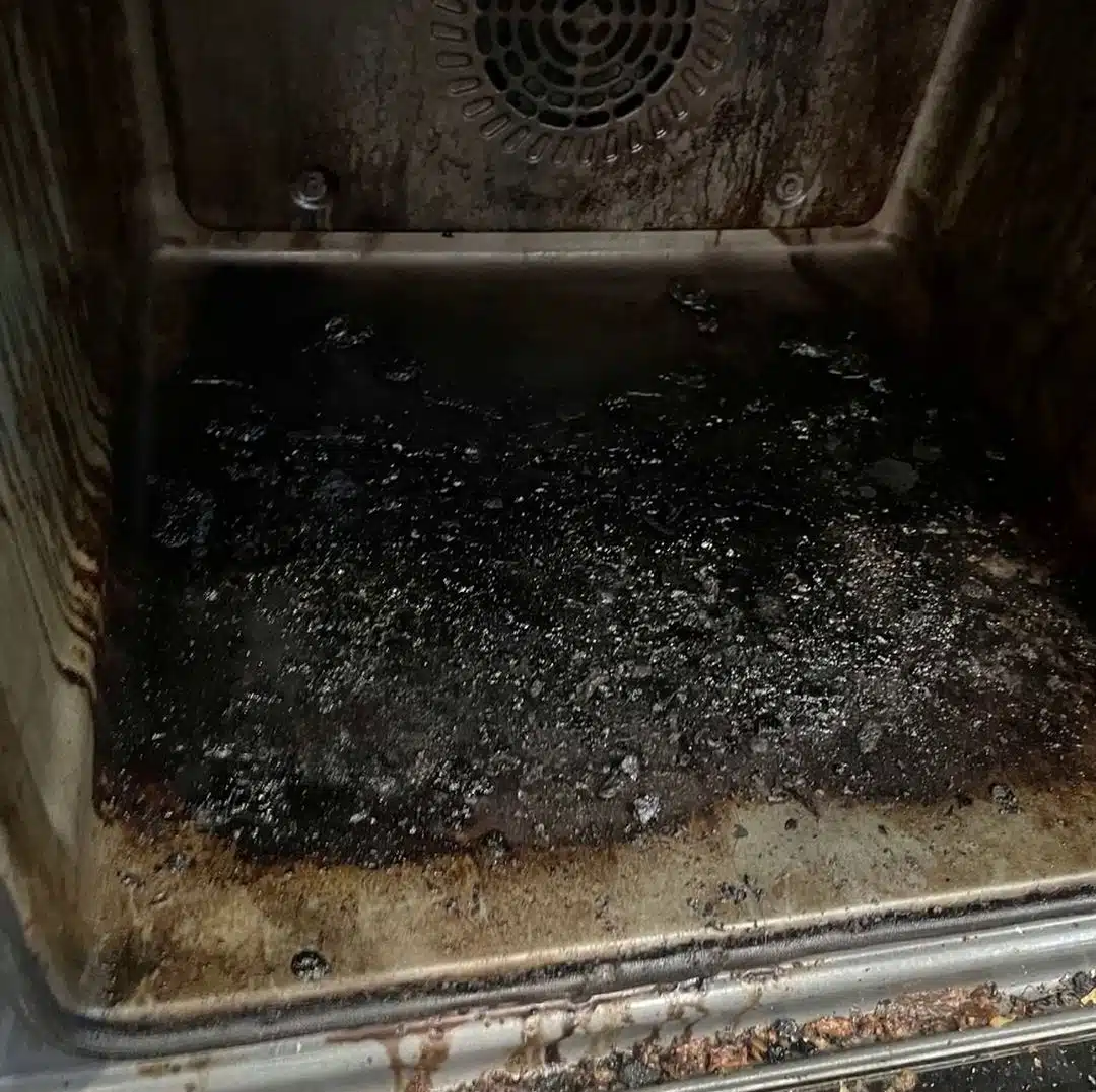 Burnt-on carbon residue in a dirty oven