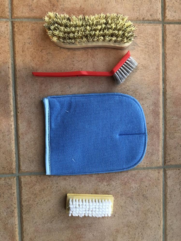 Scrubbing brushes and a microfibre mitt