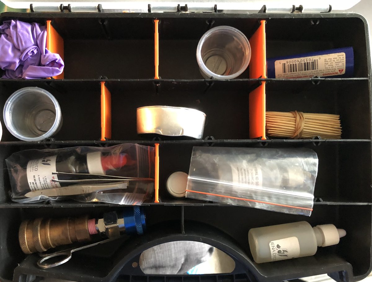Upholstery fibre identification test kit with tweezers, sample bags and reagents